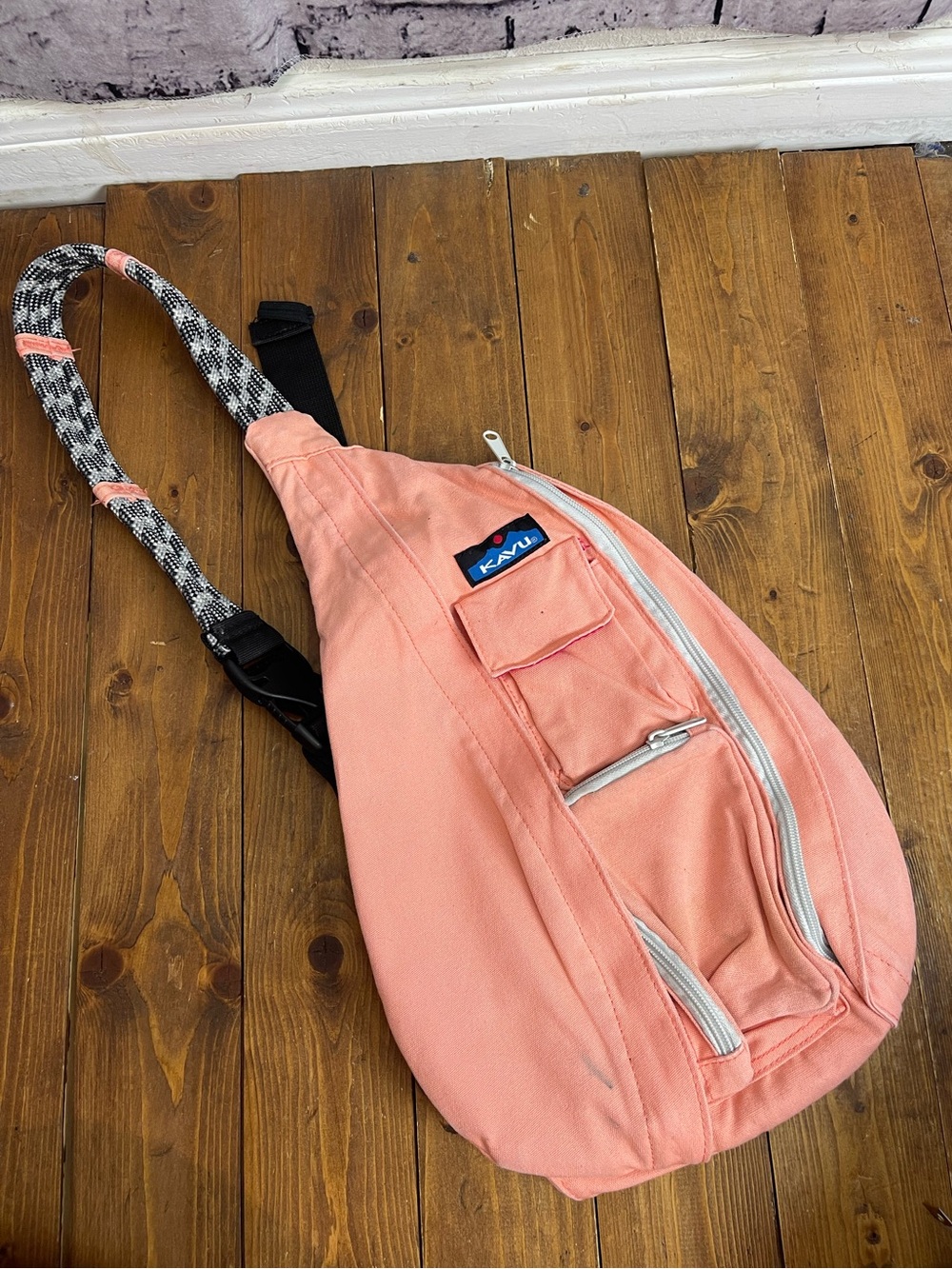 Kavu sling backpack peach color